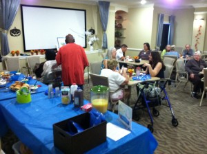 Residents mingling with other residents at Laurel Oaks Senior Apartments Fall Brunch in Okeechobee, FL.